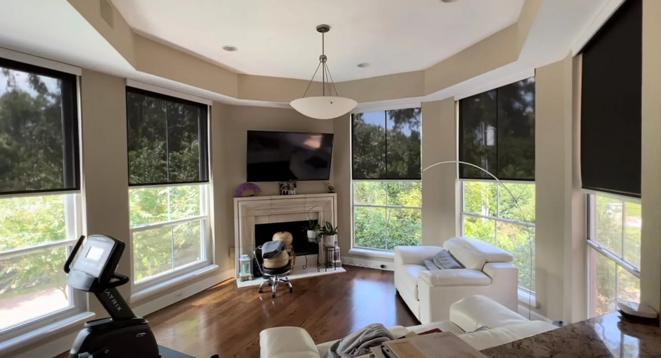 Interior shades in a double-height living room