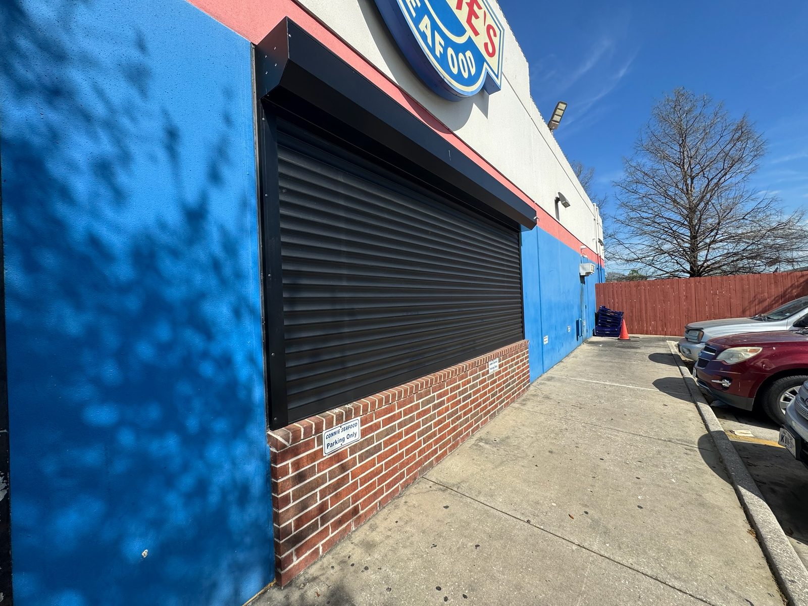 Black security shutter on seafood restaurant