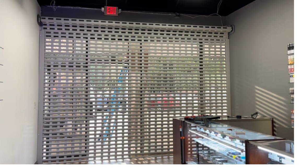 Perforated shutter inside shop
