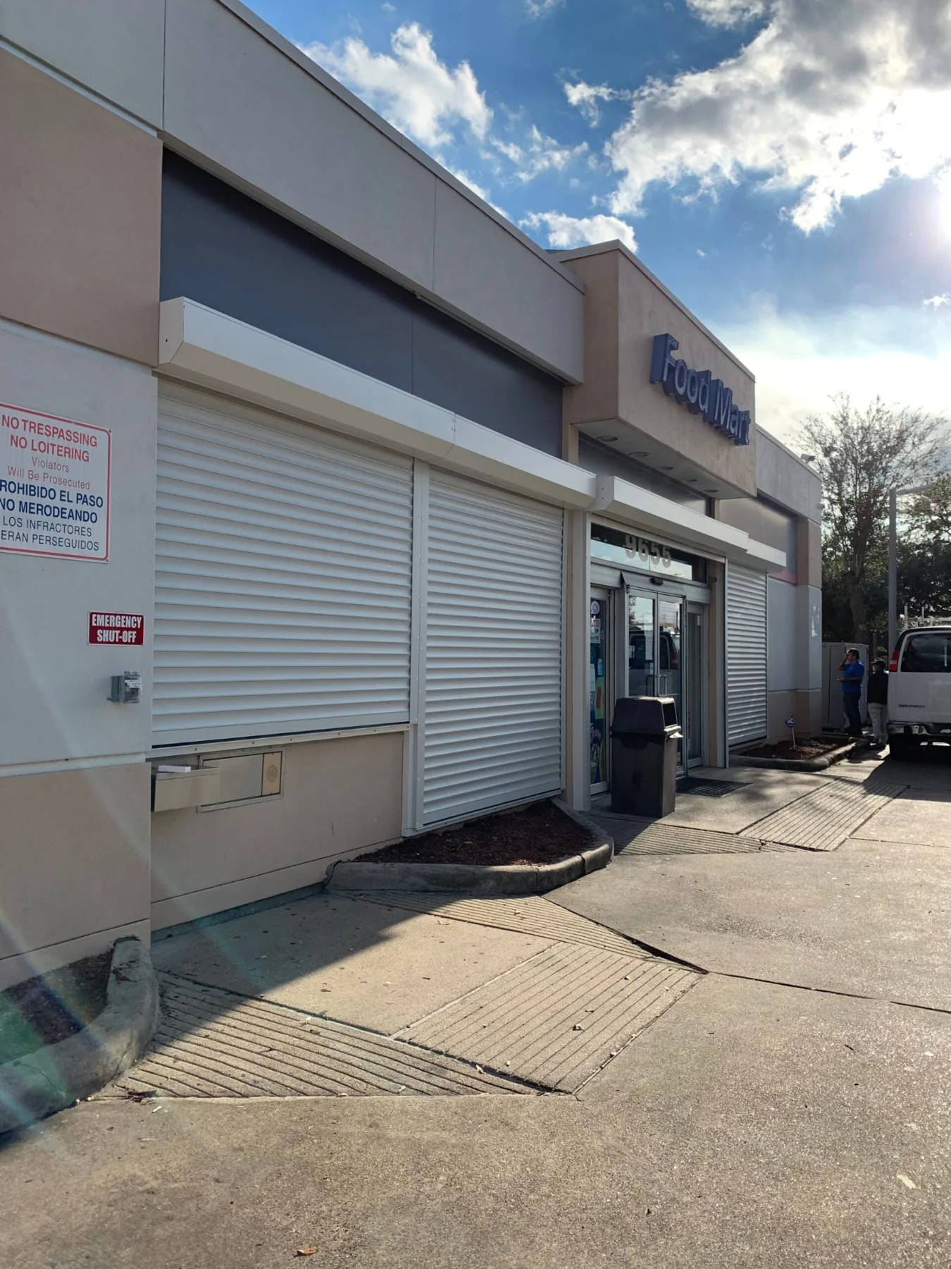 White security shutters on convenience store